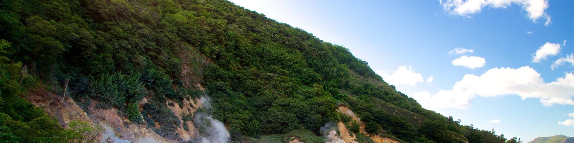 Sulphur Springs which includes a hot spring, tranquil scenes and mist or fog