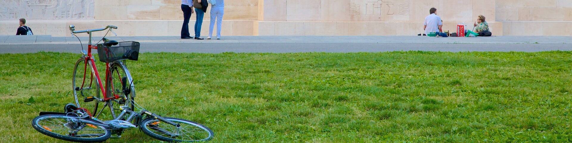 Reformation Wall Monument which includes a monument and a statue or sculpture as well as a large group of people