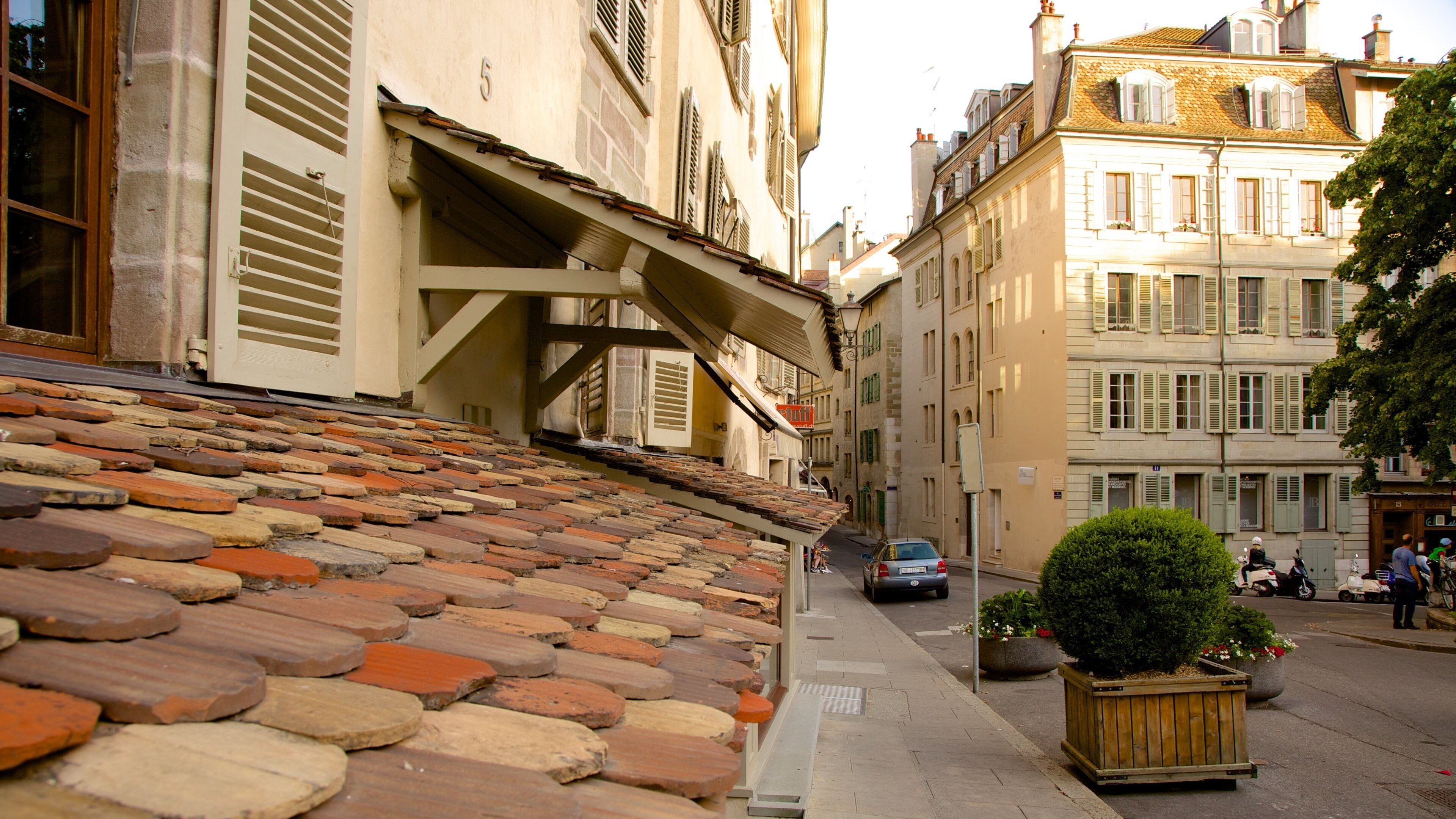 Plaza de Bourg-de-Four que incluye escenas cotidianas
