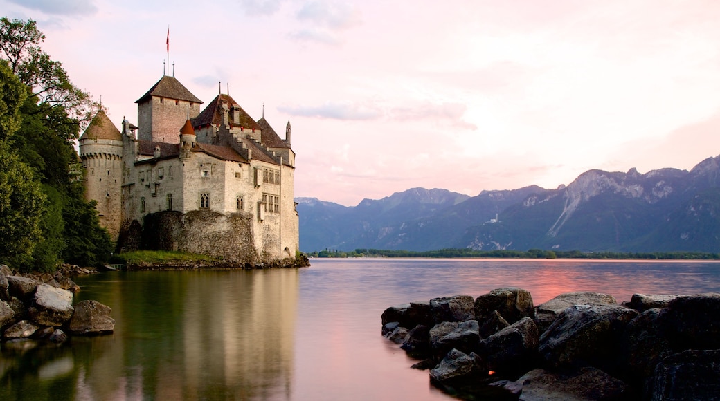 Chateau de Chillon featuring a castle, heritage architecture and a lake or waterhole