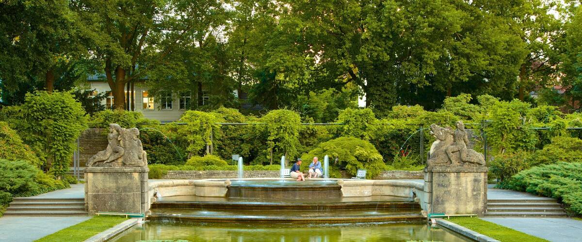 Bern Rose Garden which includes a fountain, a pond and a garden