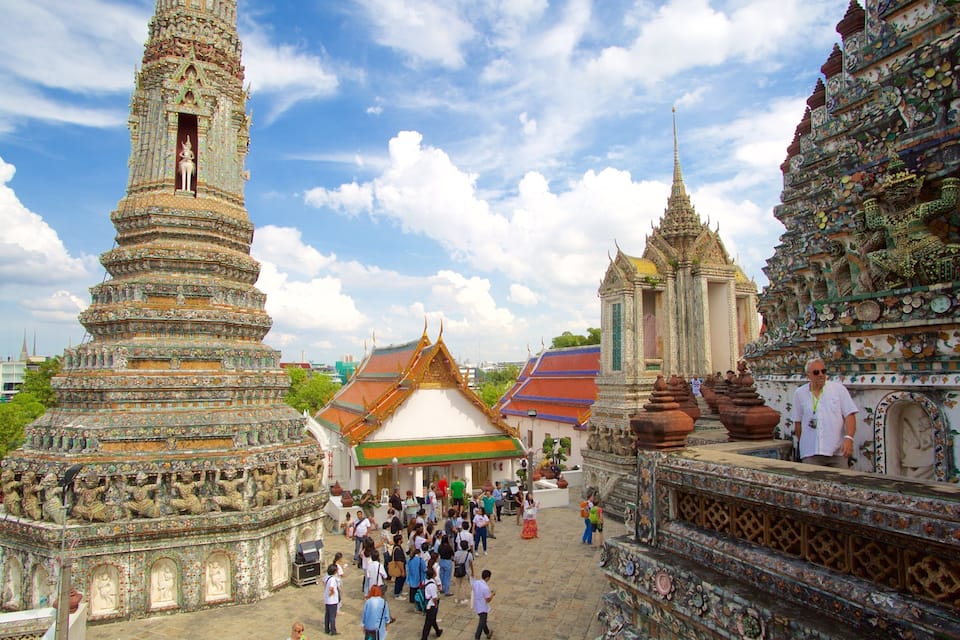 A temple complex with ornate architecture, including tiered towers and detailed carvings.