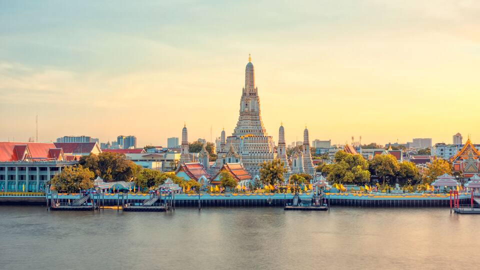 Beautiful view of Wat Arun Temple at sunset in Bangkok, Thailand