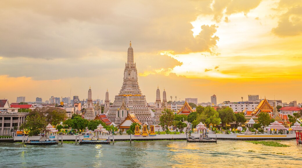 Wat Arun panorama view at sunset, A Buddhist temple in Bangkok, Thailand, Wat Arun is one of the most well known of Thailand's landmarks