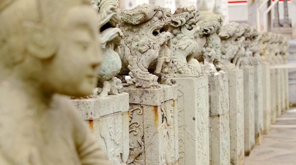 Wat Arun welches beinhaltet Monument, religiöse Aspekte und Statue oder Skulptur