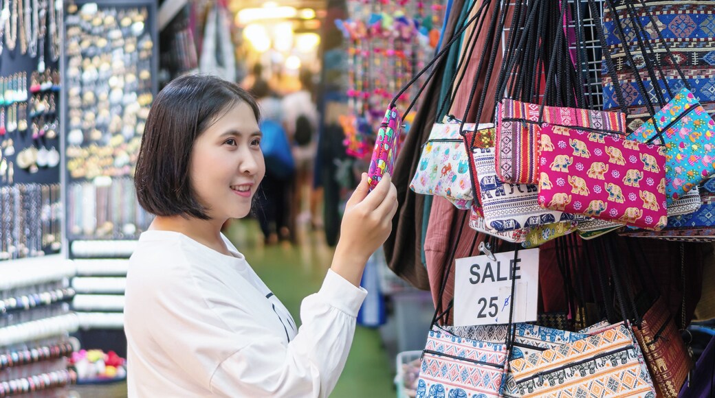 Thai traveler tourist buy souvenirs in chatuchak weekend market