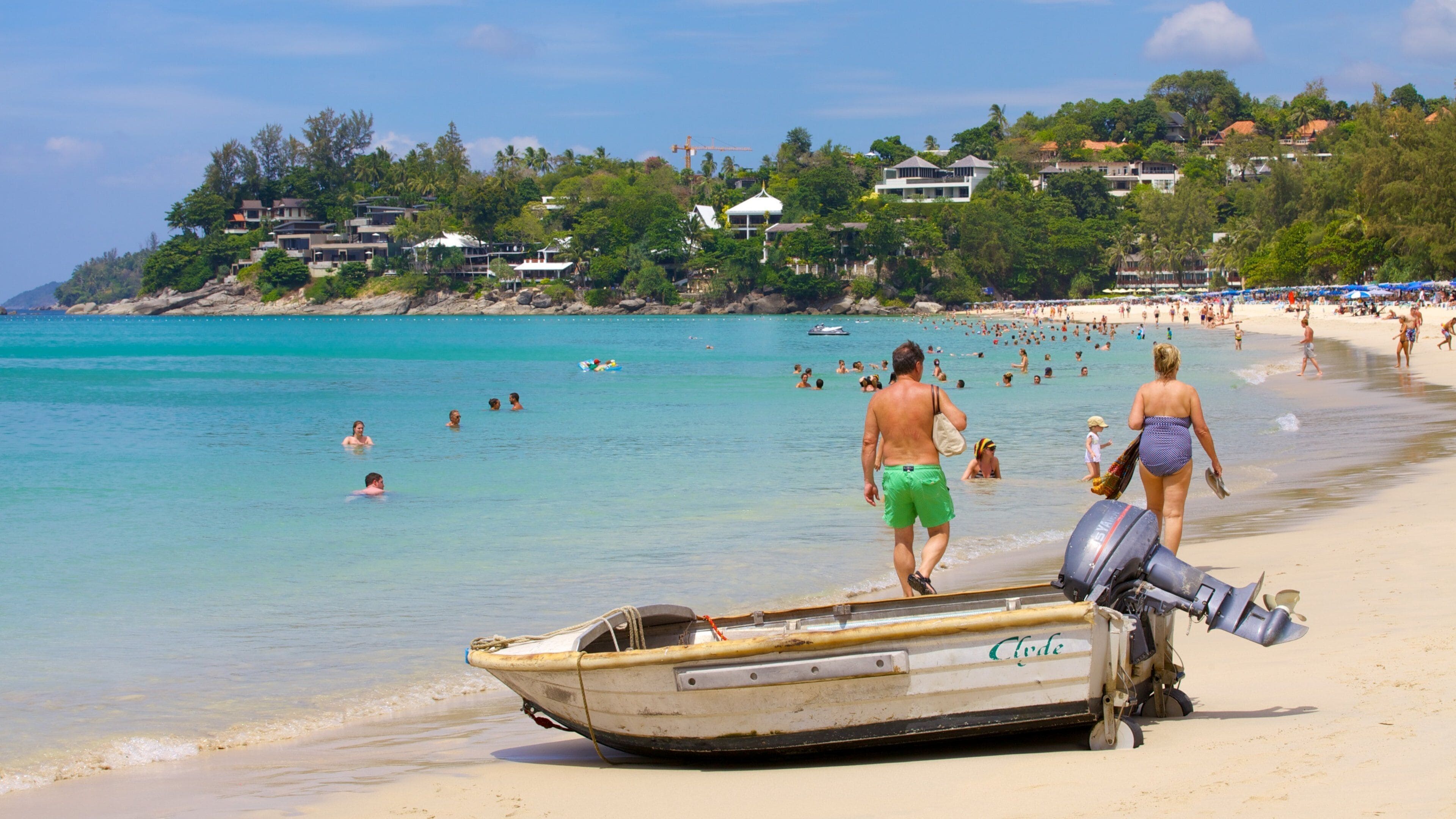 Kata Noi Beach showing tropical scenes, swimming and landscape views