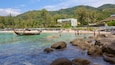 Kata Noi Beach which includes tropical scenes, a luxury hotel or resort and landscape views