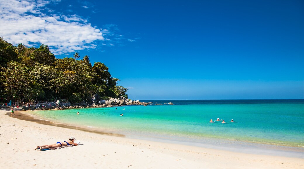 PUKET, THAILAND-JAN 24,2016: Unidentified people are relaxing on Kata beach during a sunny day in Phuket on Jan 24, 2016, Thailand.