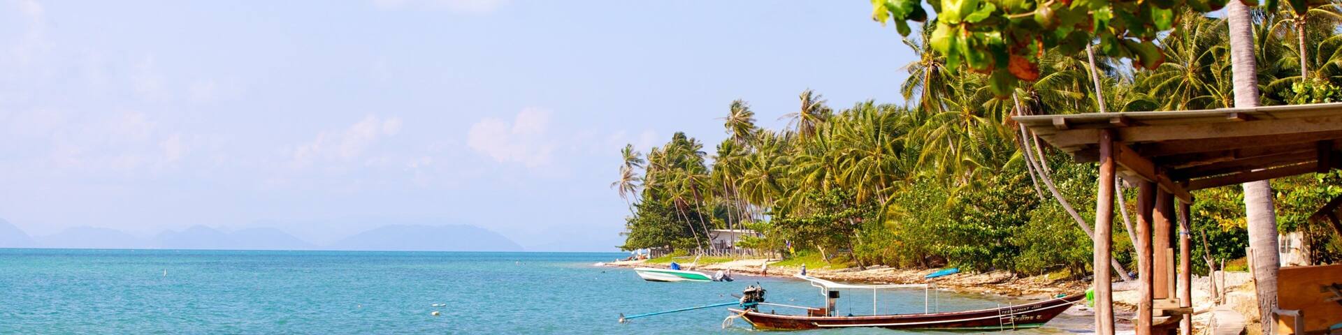 Pangka Beach which includes a pebble beach, a beach and tropical scenes