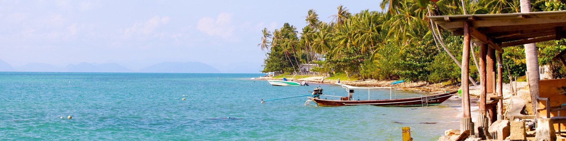 Pangka Beach which includes a pebble beach, a beach and tropical scenes