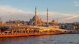 Galata Bridge featuring a sunset, a city and a river or creek