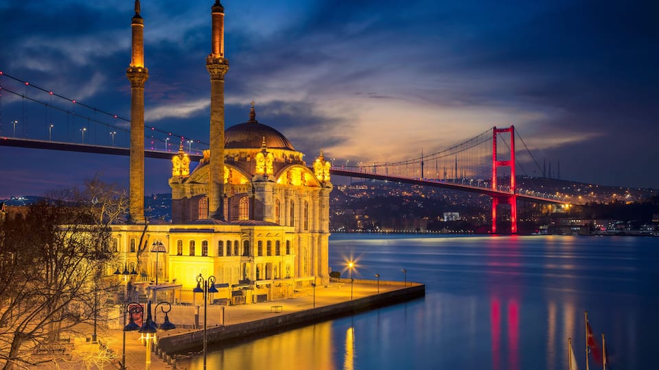 Istanbul. Image of Ortakoy Mosque with Bosphorus Bridge in Istanbul during twilight blue hour.