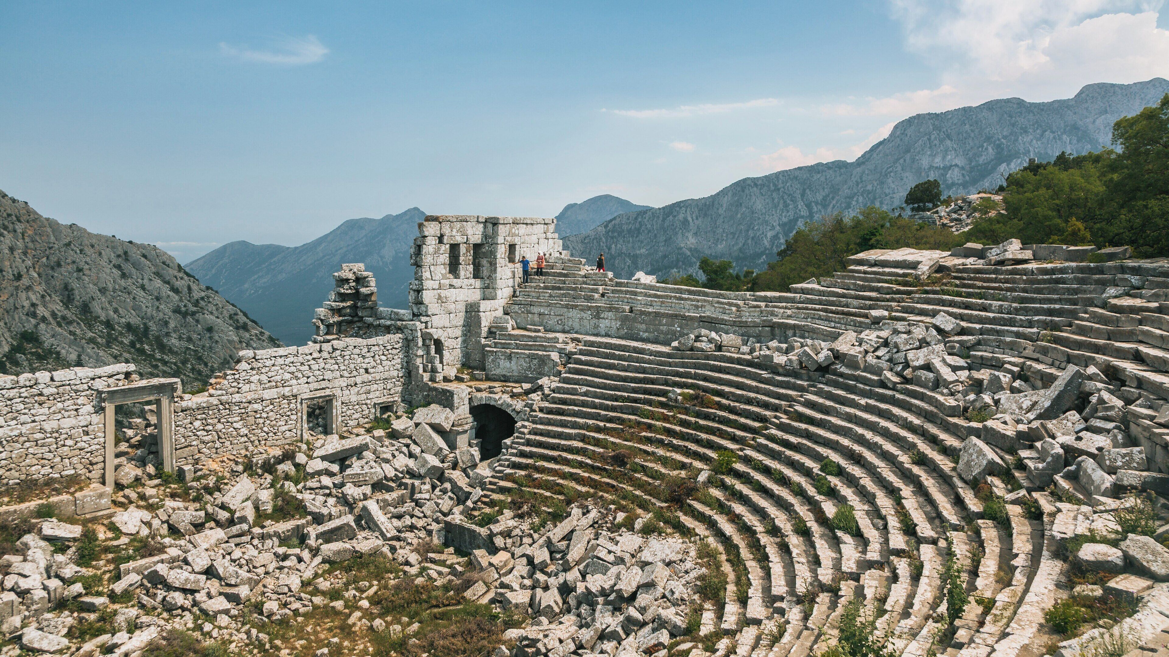 Exploring the ancient ruins of Termessos in Antalya, Türkiye, surrounded by stunning mountain views and rich history