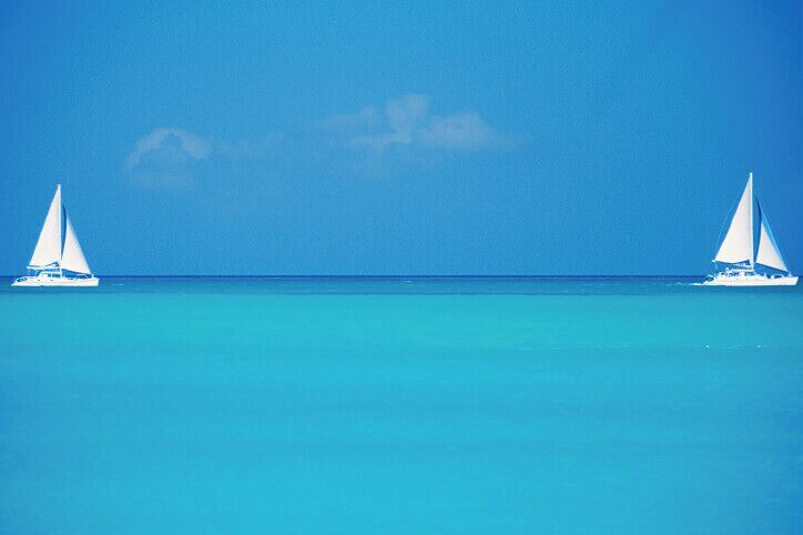Caribbean, Turks and Caicos Islands, Providenciales, Grace Bay Beach, Sailboats in ocean