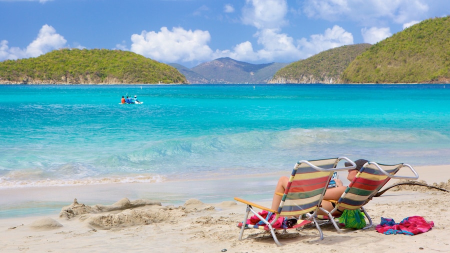 Cinnamon Bay which includes a sandy beach and island views