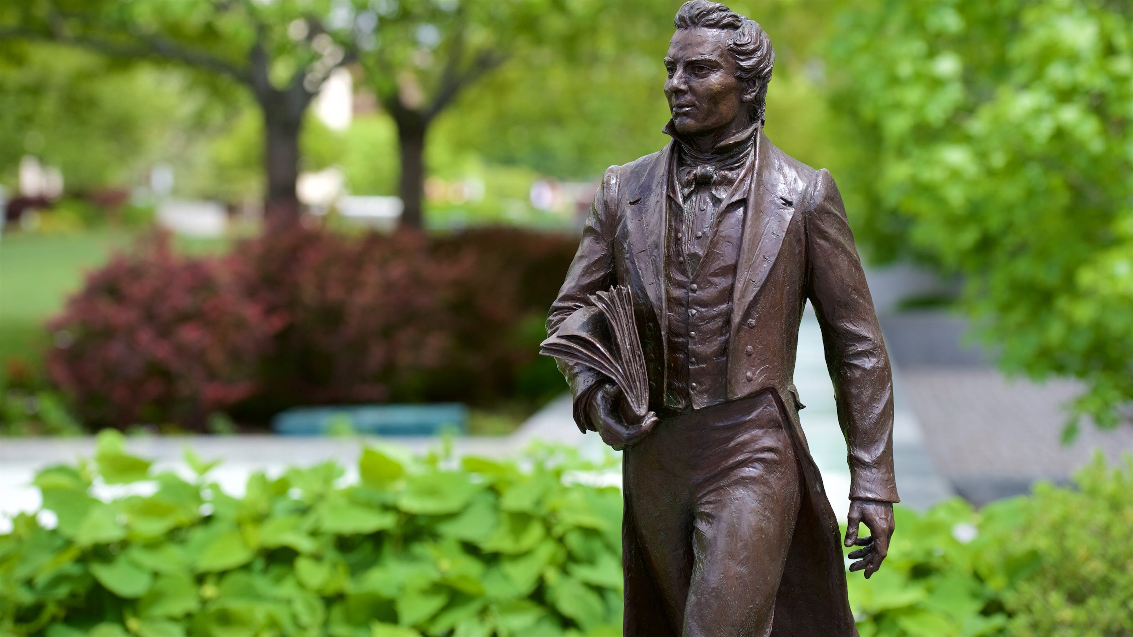 Temple Square which includes a park and a statue or sculpture
