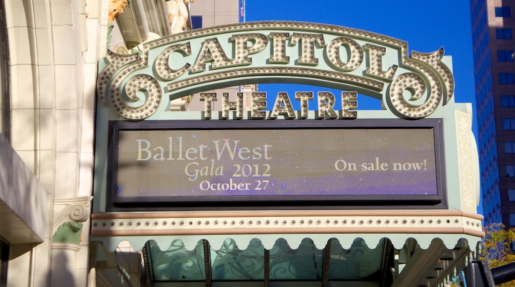 Capitol Theater featuring theatre scenes, performance art and a city