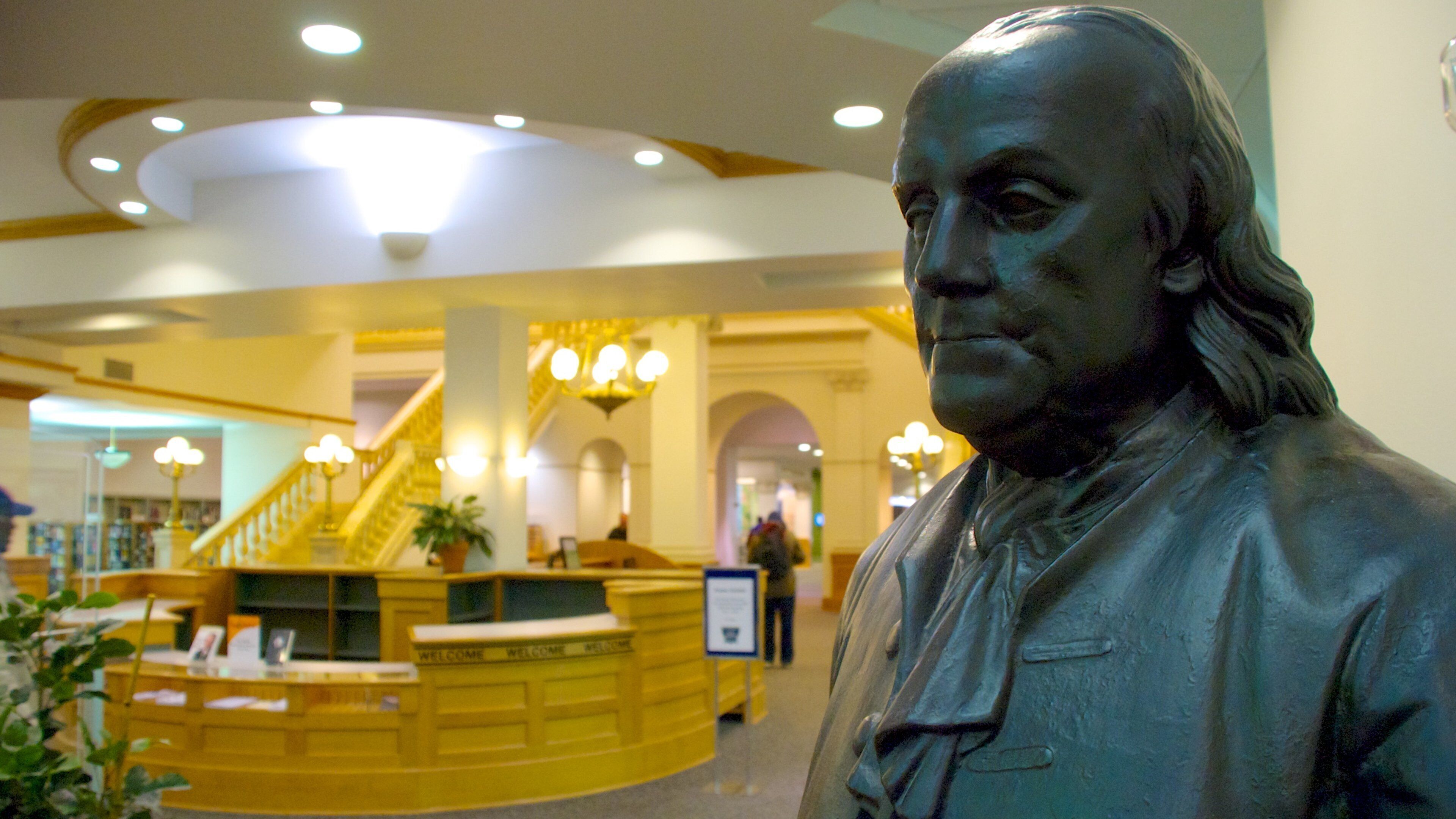 Milwaukee Public Library which includes a statue or sculpture, art and interior views