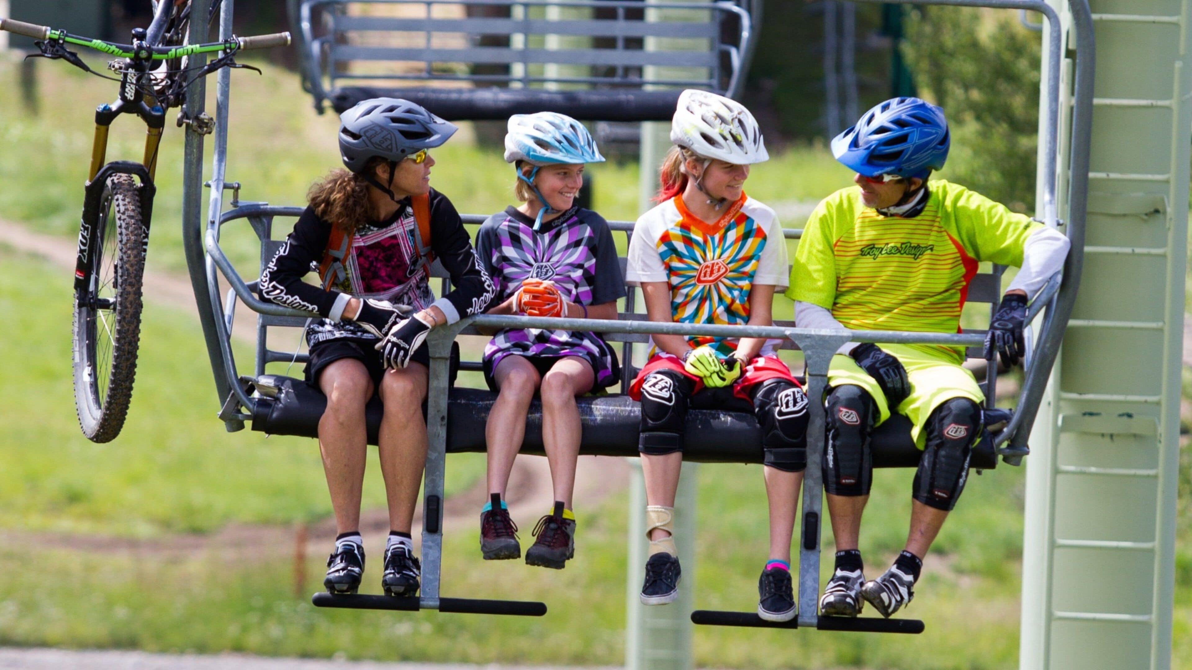 Grand Targhee Resort showing mountain biking and a gondola as well as a family