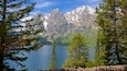 Jenny Lake which includes mountains and a lake or waterhole