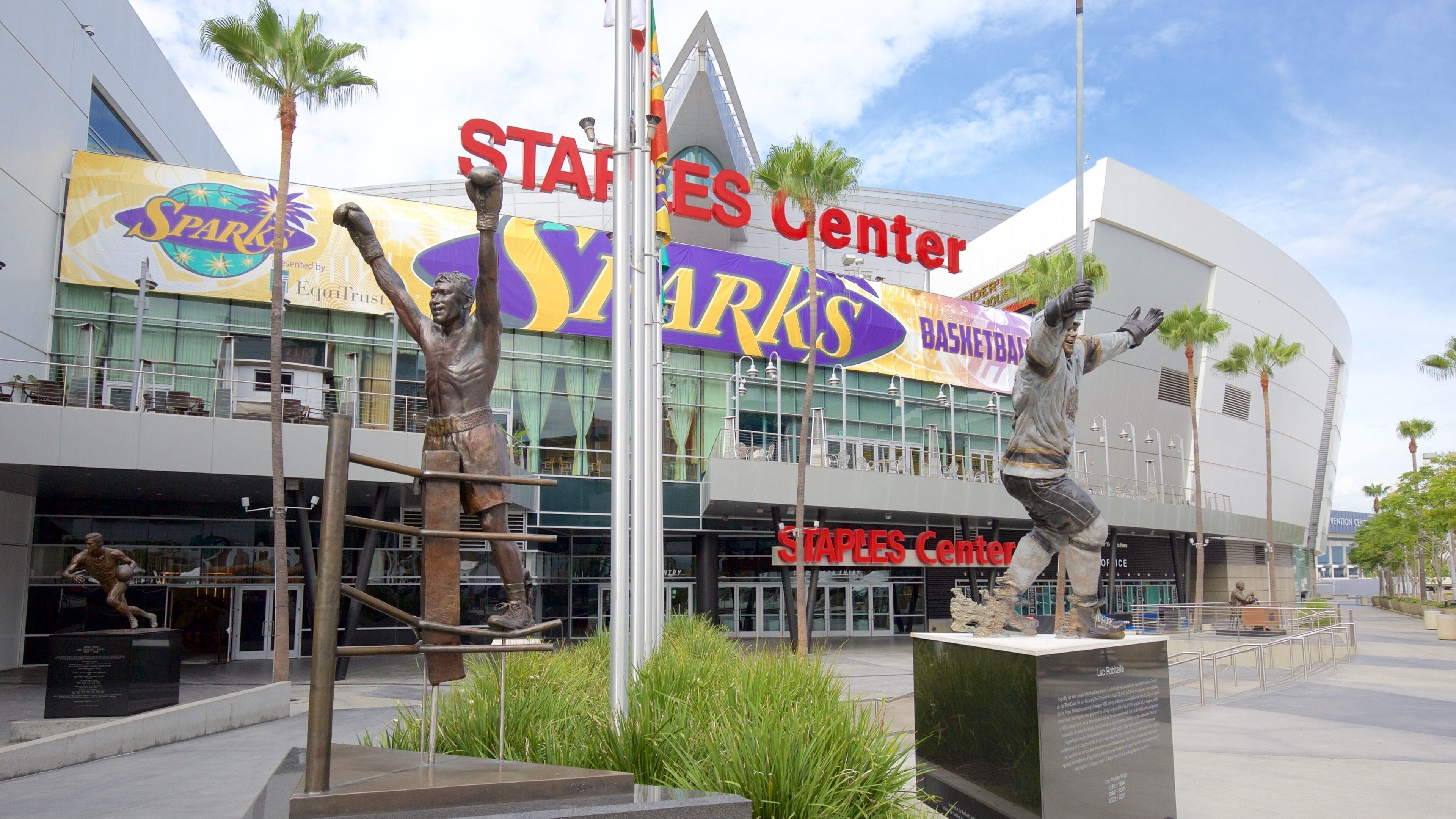 Staples Center showing a statue or sculpture and signage