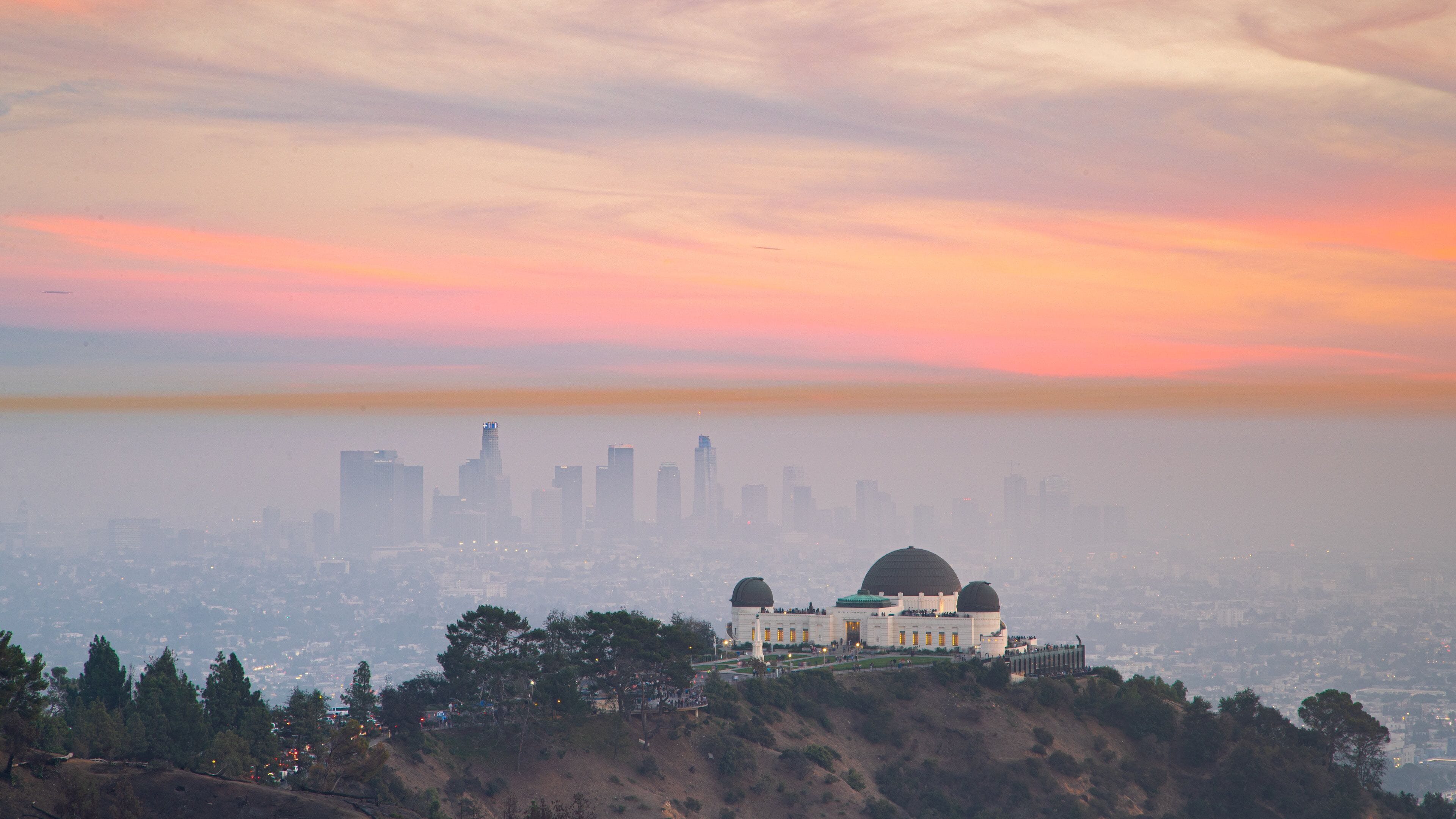 Griffith Observatory which includes landscape views, a city and an observatory