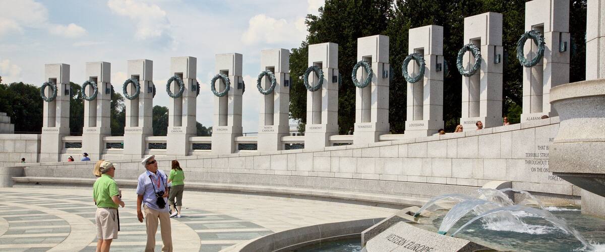 National World War II Memorial which includes a fountain as well as a small group of people