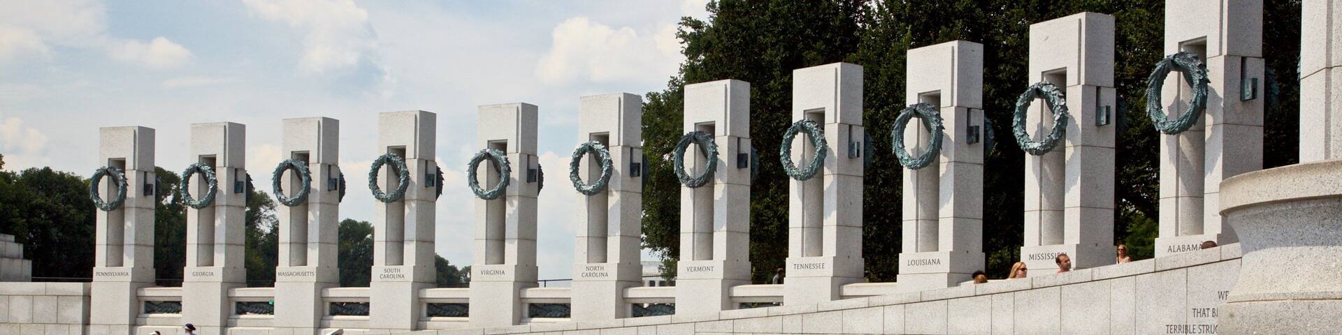 National World War II Memorial which includes a fountain as well as a small group of people