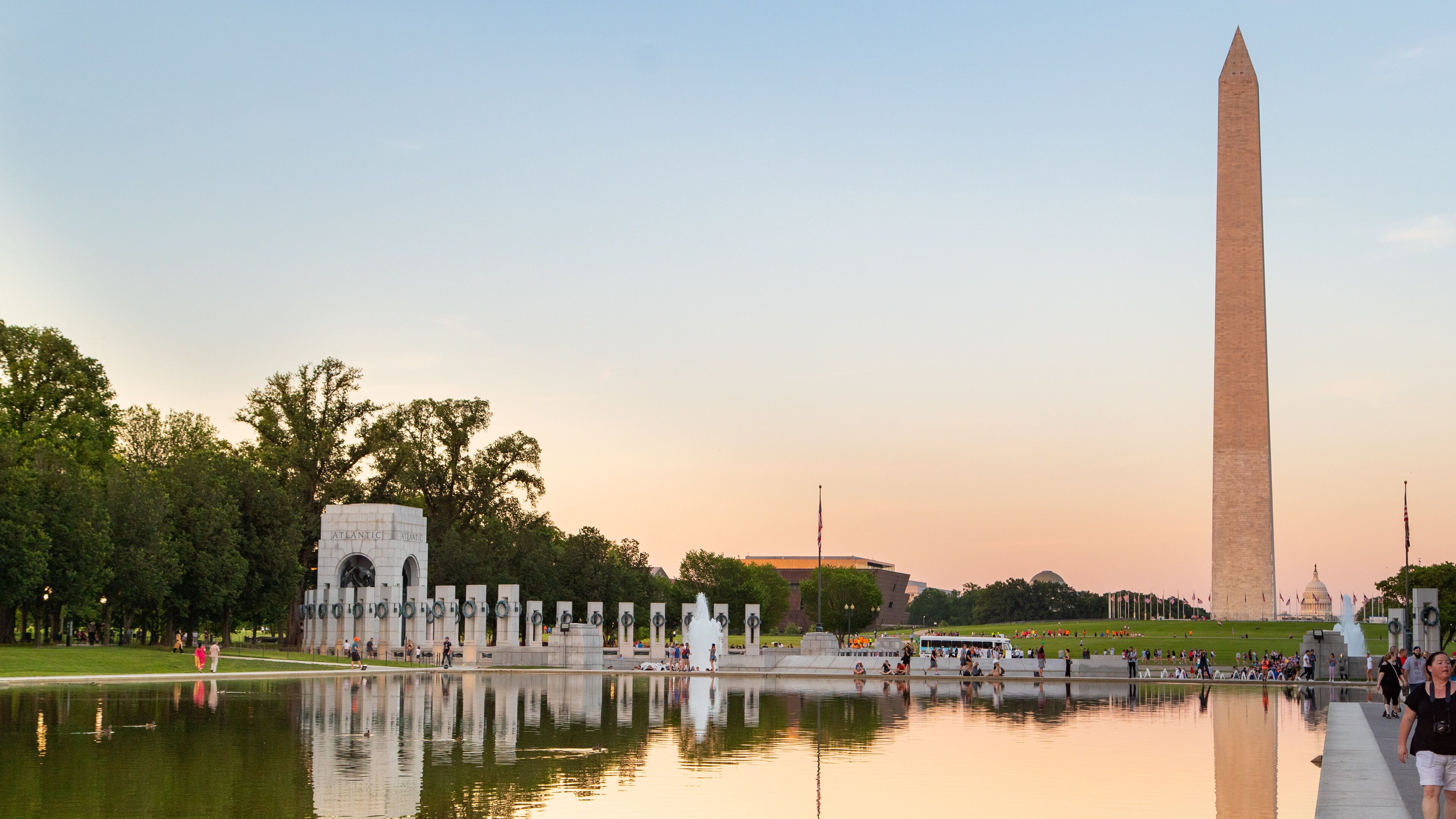 National World War II Memorial showing a lake or waterhole, a sunset and a monument