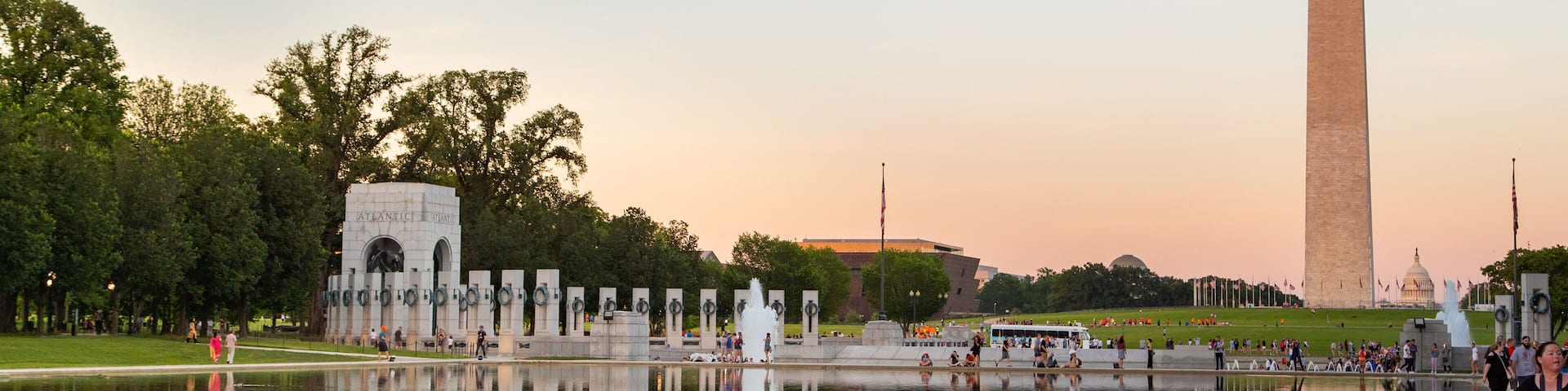 National World War II Memorial showing a lake or waterhole, a sunset and a monument