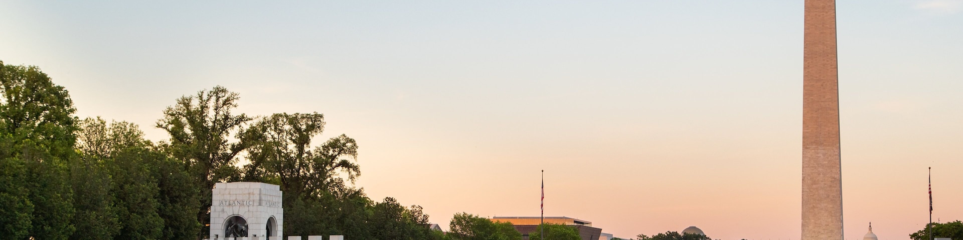 National World War II Memorial showing a lake or waterhole, a sunset and a monument