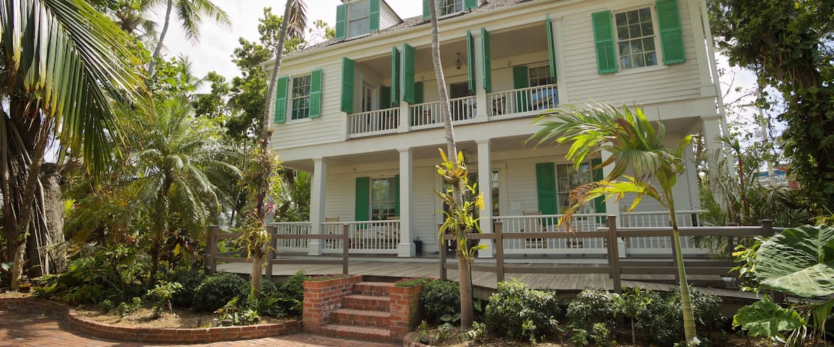 Audubon House and Tropical Gardens featuring a house