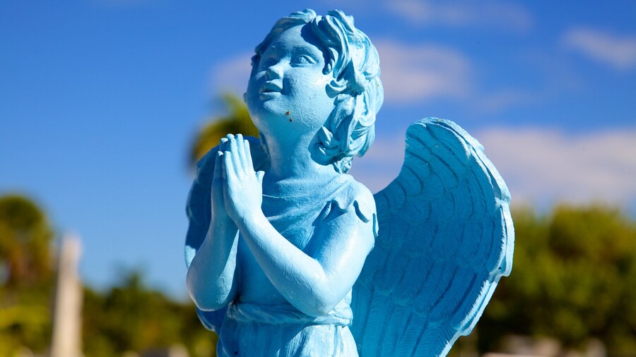 Key West Cemetery featuring a statue or sculpture and a cemetery
