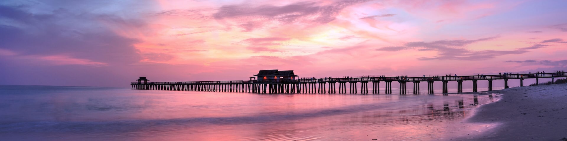 Pink and purple sunset over the Naples Pier