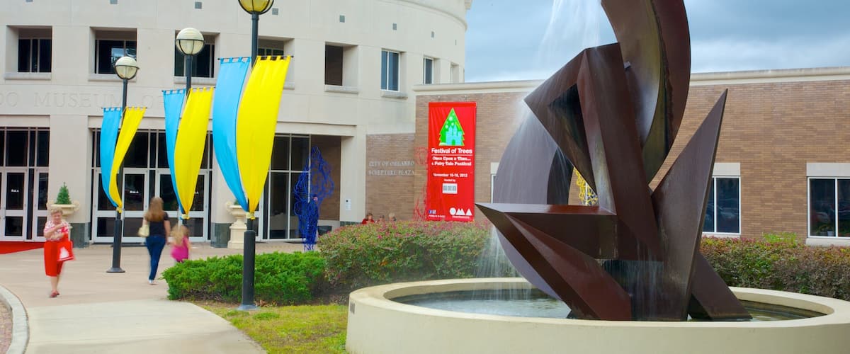 Orlando Museum of Art showing outdoor art and a fountain