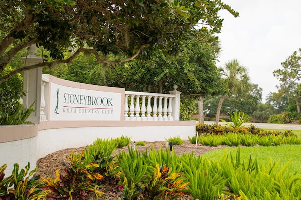 Stoneybrook Golf & Country Club which includes signage and a garden