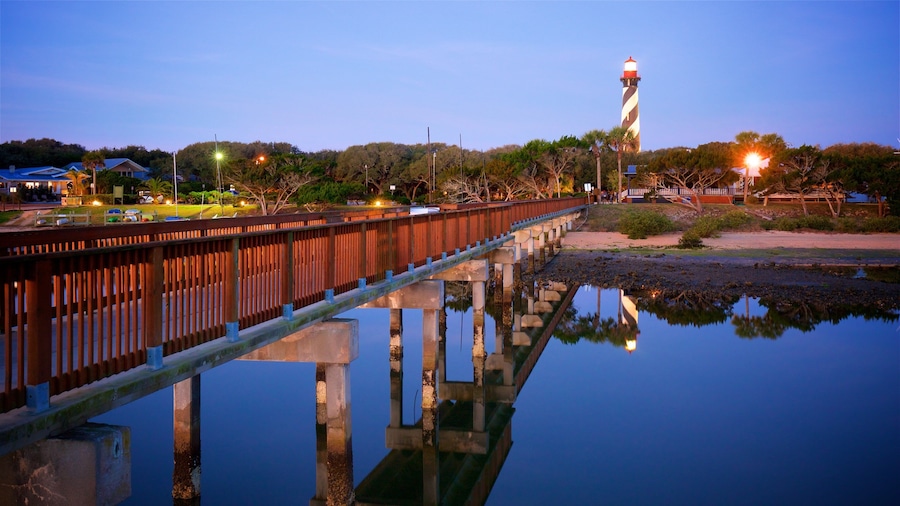 St. Augustine Lighthouse and Museum featuring a river or creek, a lighthouse and a sunset