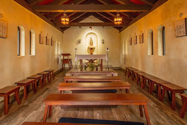 Mission of Nombre de Dios featuring a church or cathedral and interior views