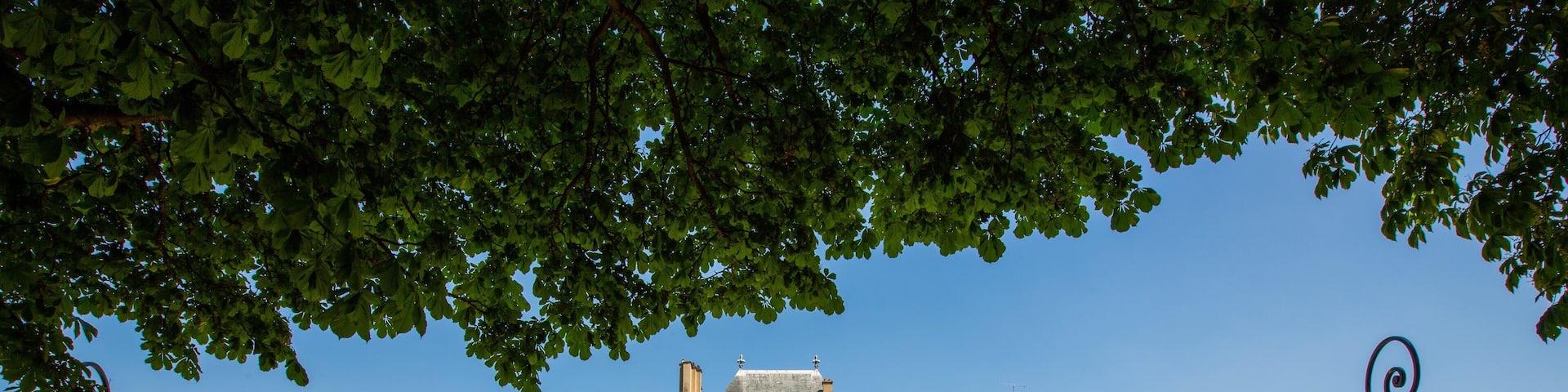 Place des Vosges which includes heritage architecture and a garden