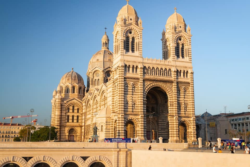 A large, ornate cathedral with multiple domes and arches.
