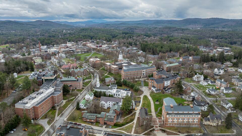 Spring aerial photo of Hanover, NH on a partly cloudy day.