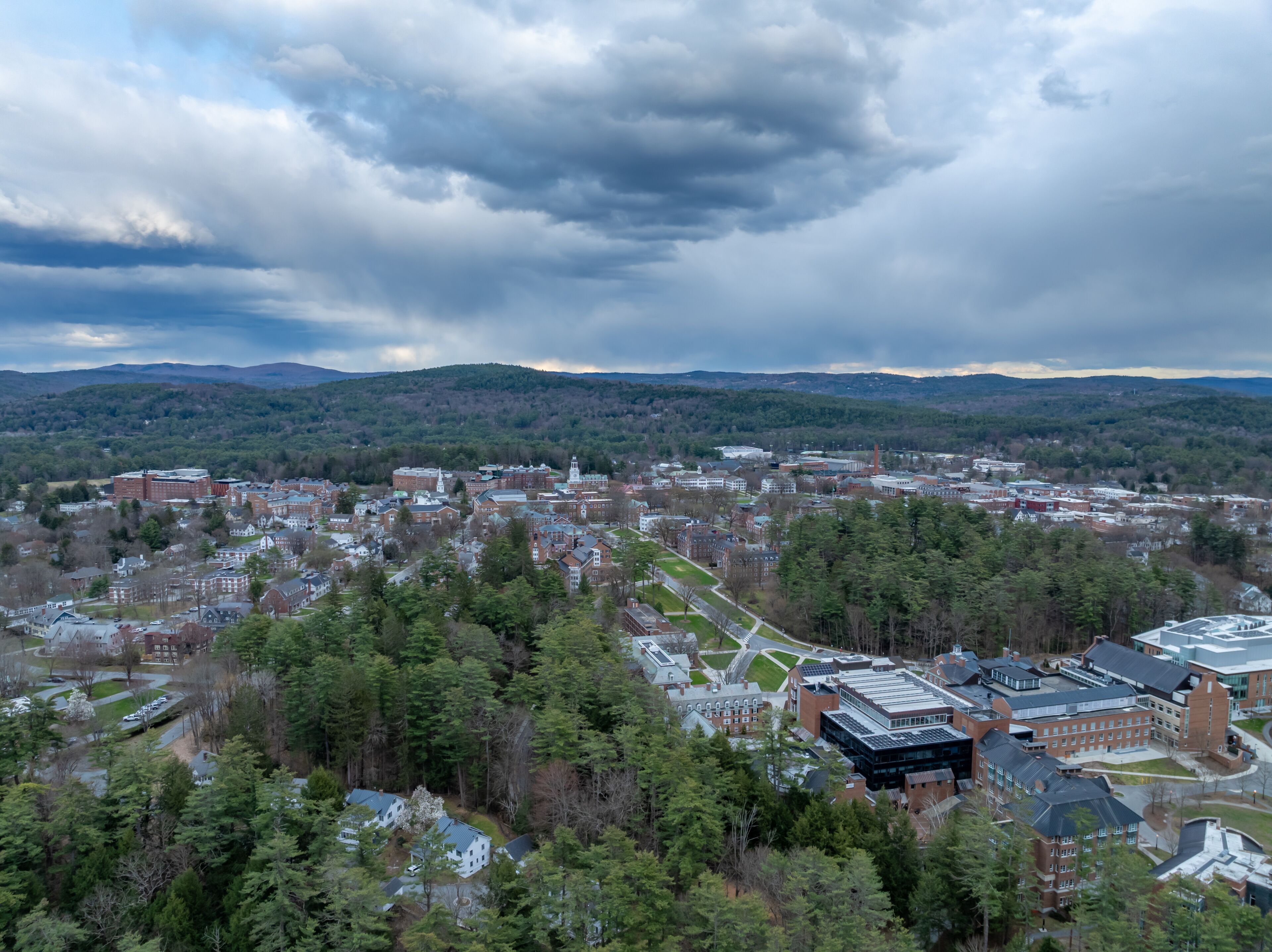 Spring aerial photo of Hanover, NH on a partly cloudy day.
