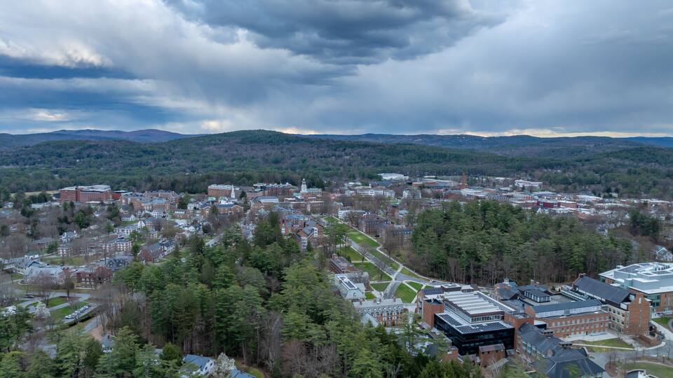 Spring aerial photo of Hanover, NH on a partly cloudy day.
