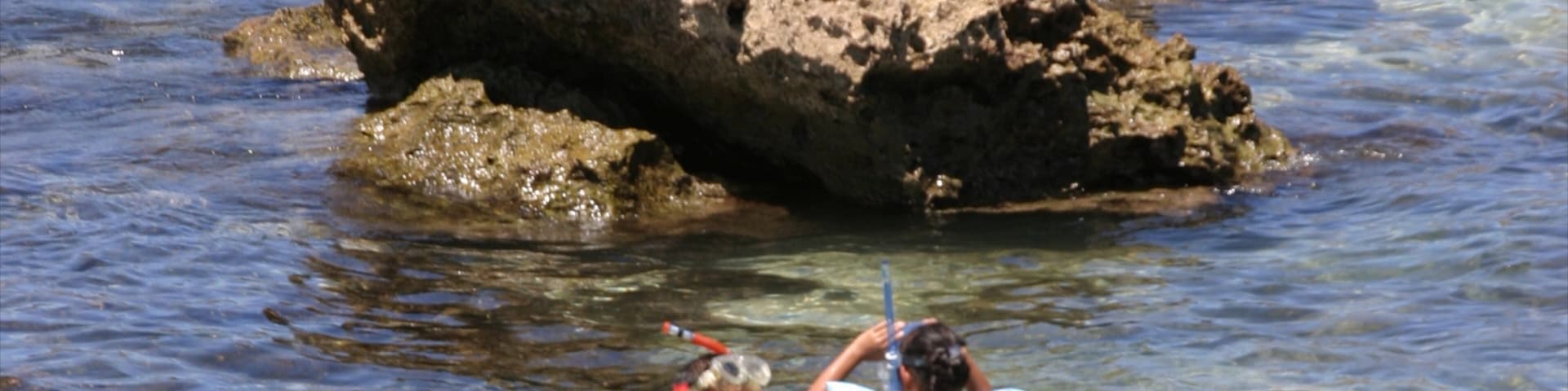 Pupukea Beach Park caratteristiche di nuoto, costa frastagliata e vista del paesaggio