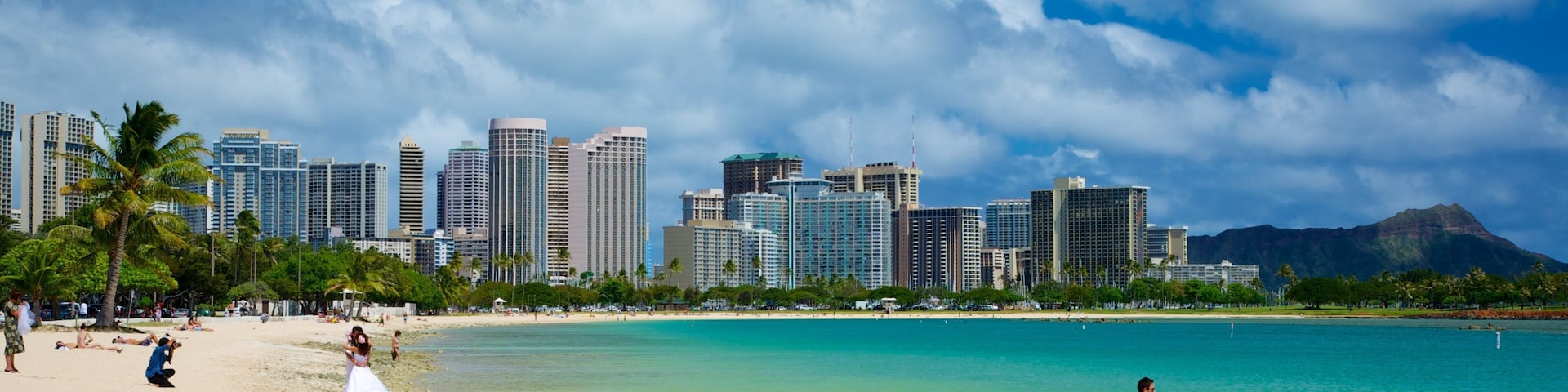 Ala Moana Beach Park featuring modern architecture, tropical scenes and skyline