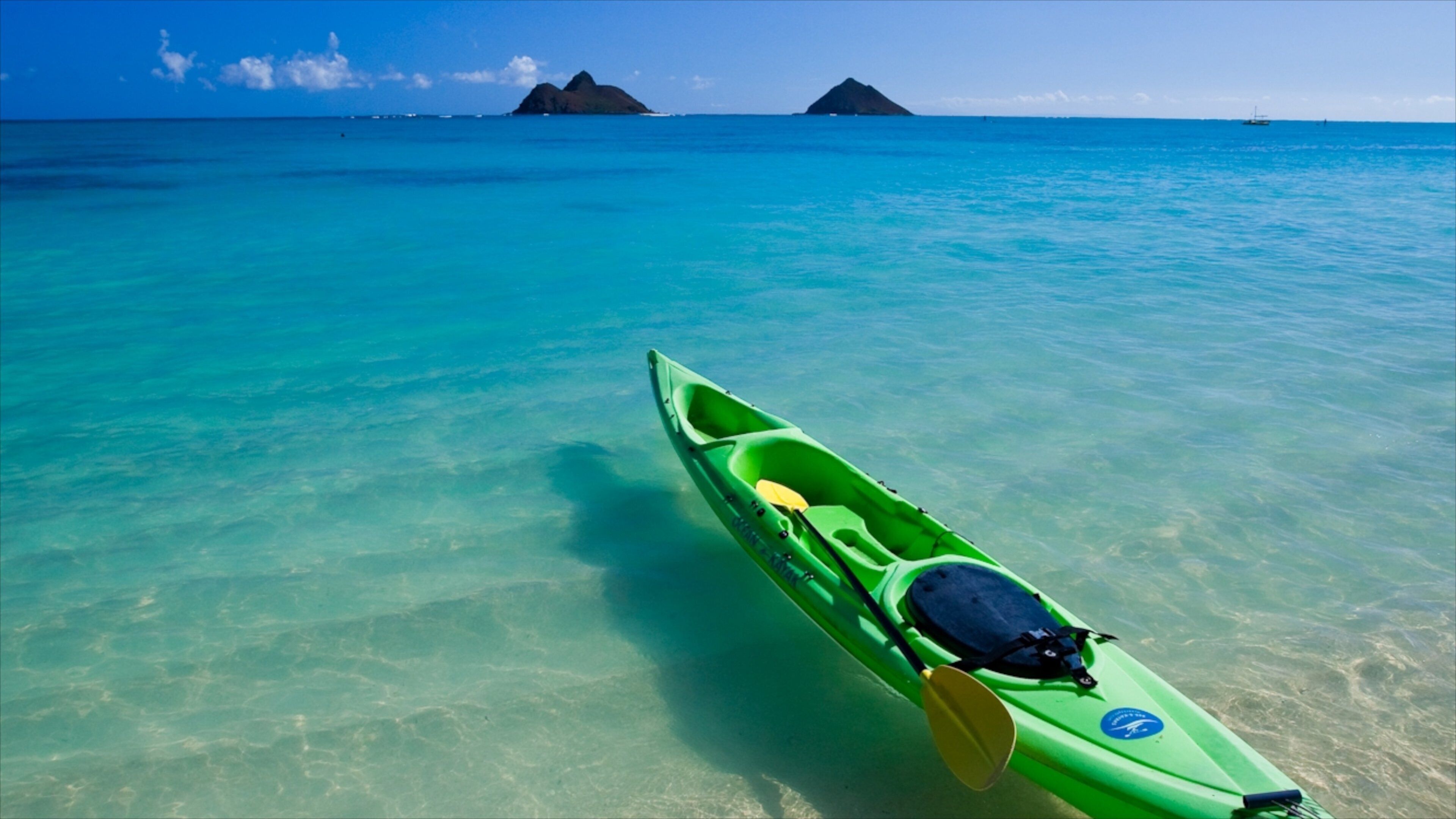 Kailua Beach which includes landscape views, a beach and kayaking or canoeing