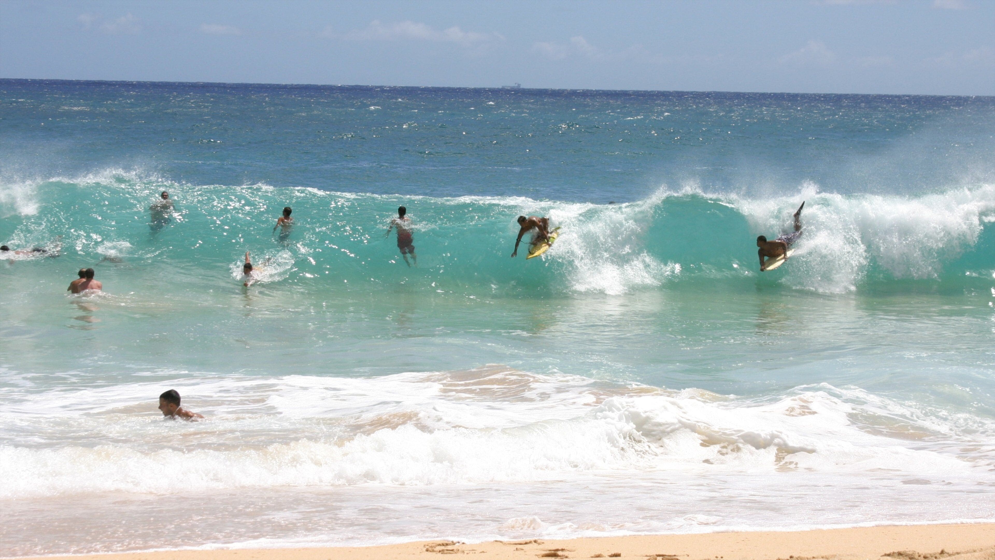Makapuu Beach Park showing waves, a sandy beach and landscape views