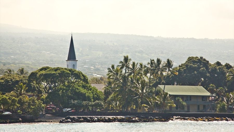 Hulihee Palace featuring a coastal town, mist or fog and general coastal views