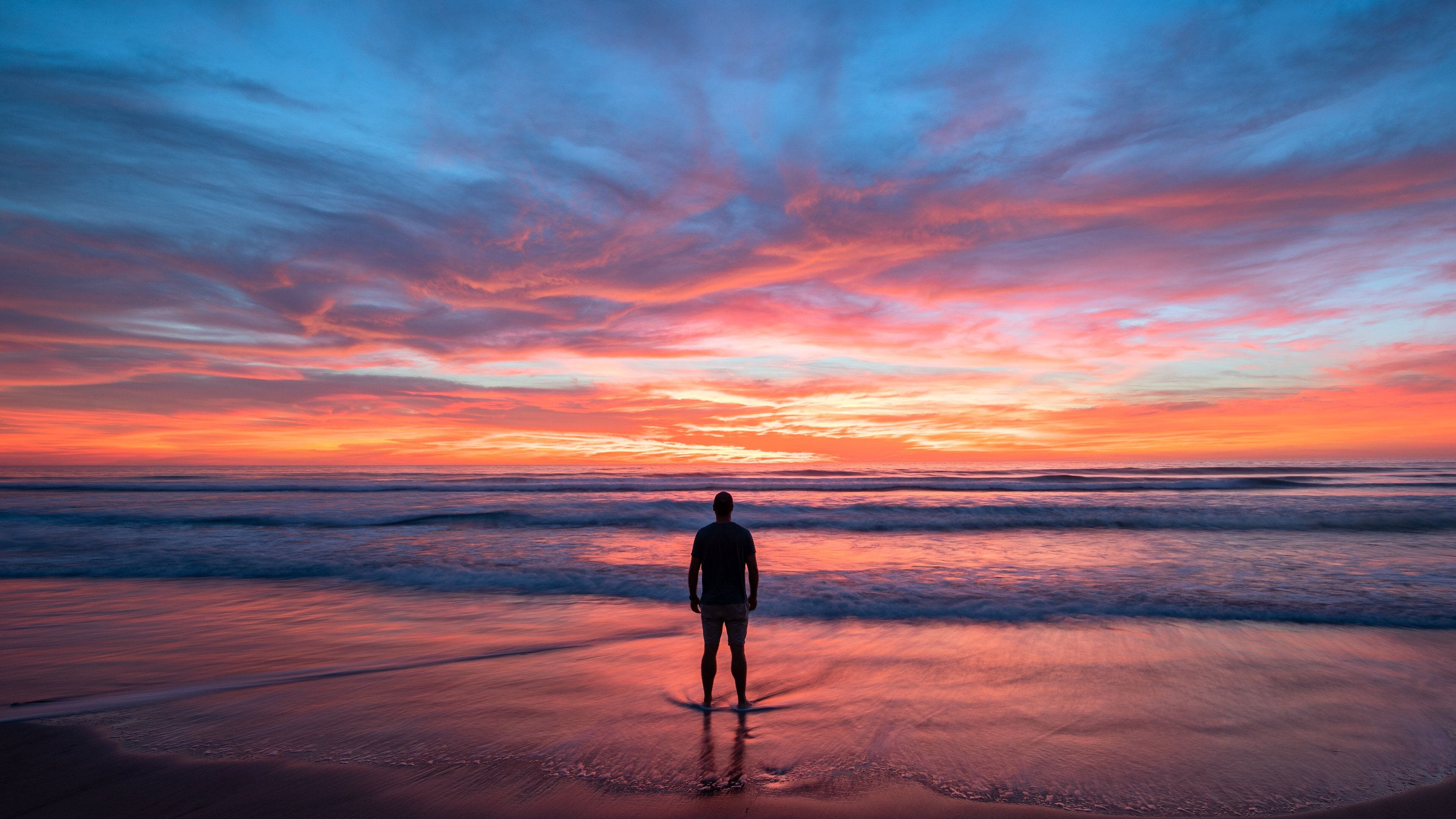 Torrey Pines State Beach featuring a sandy beach, general coastal views and a sunset